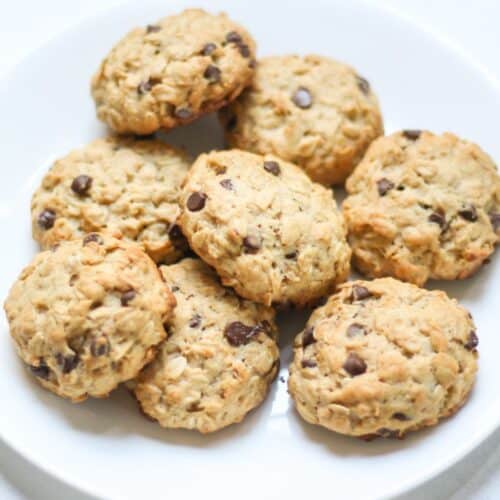 Oatmeal chocolate chips cookies on a white plate.