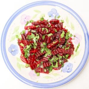 Easy beetroot salad served on a salad plate.