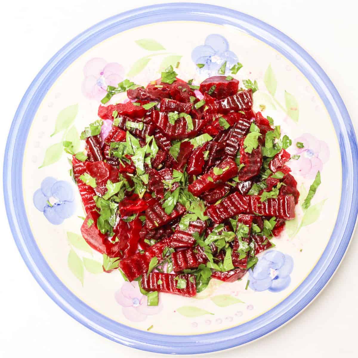 Easy beetroot salad served on a salad plate.